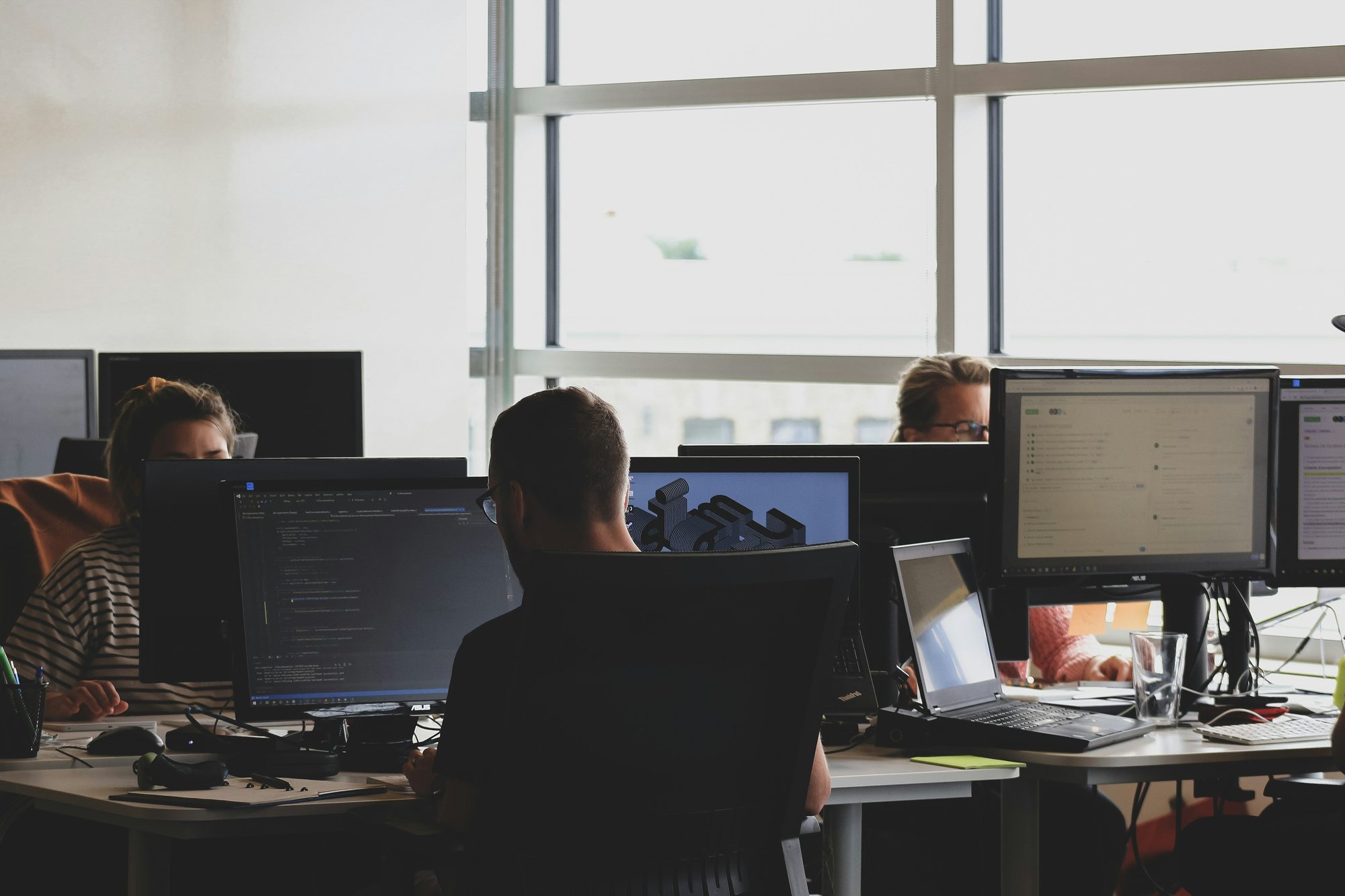 Operations team working at their desks